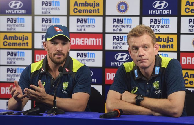 Australian cricket coach Andrew McDonald along with captain Aaron Finch during a press conference in Mumbai on Friday