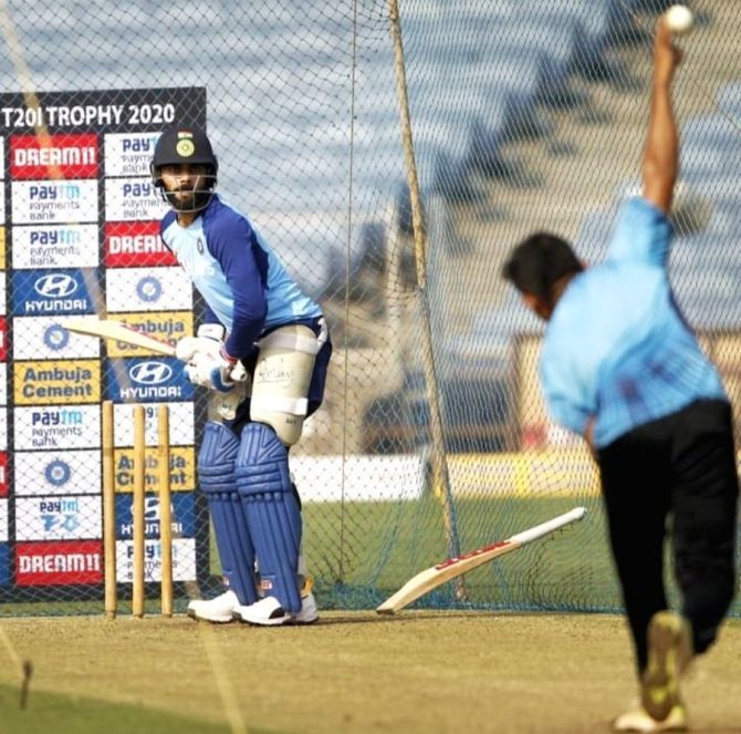 Virat Kohli bats during a nets session in Pune on Thursday