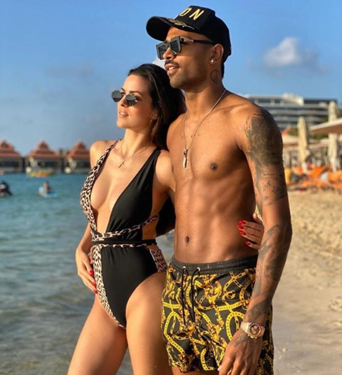 Hardik Pandya and his fiancee flaunt their beach bodies - Rediff Cricket