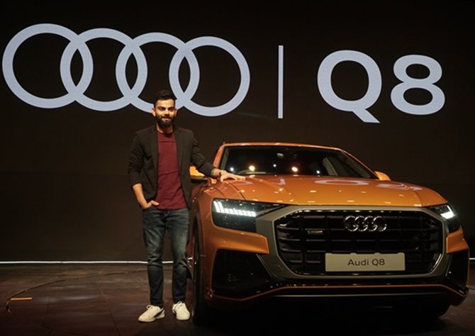 Virat Kohli with Audi Q8