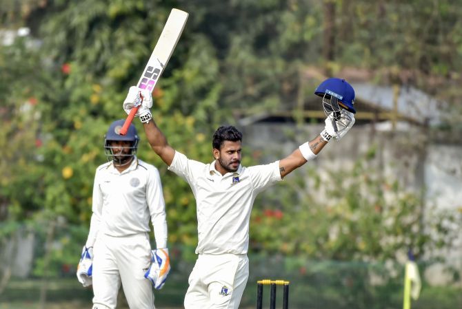 Bengal's Manoj Tiwary celebrates after scoring 300 against Hyderabad on Day 2 day of their Ranji Trophy match, at Kalyani, West Bengal on Monday