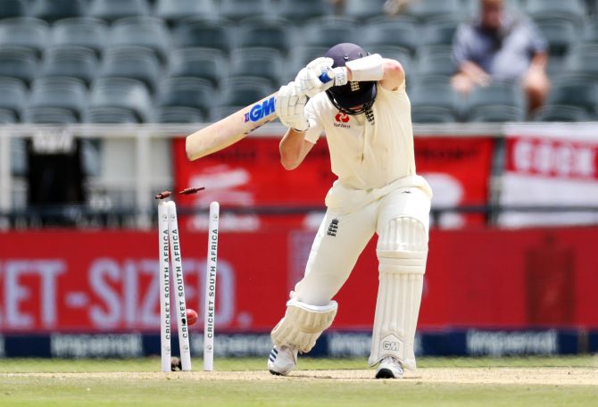 England's Ollie Pope is bowled out by South Africa's Anrich Nortje