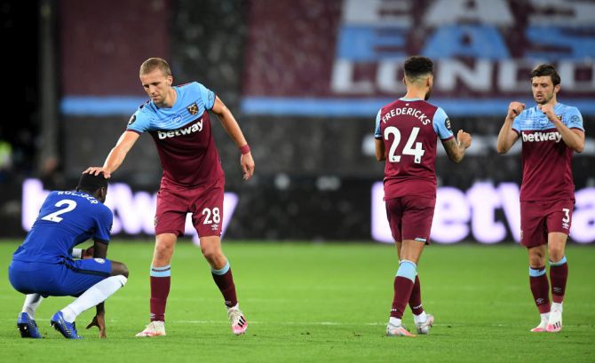 West Ham United's Tomas Soucek consoles Chelsea's Antonio Rudiger following their Premier League match at London Stadium in London