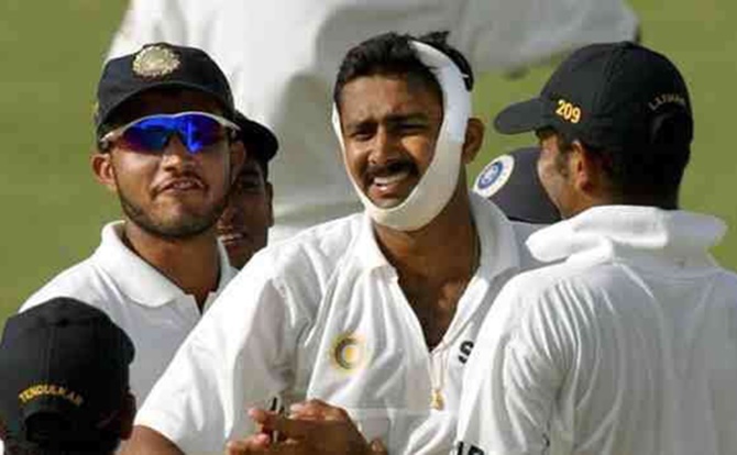 A heavily bandaged Anil Kumble appeals for a wicket during the Antigua Test against the West Indies in 2002