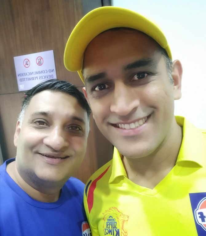 Madhu Thottappillil with captain MS Dhoni during his time as Chennai Super Kings team doctor