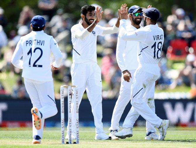 India pacer Jasprit Bumrah gets a high-five from skipper Virat Kohli after dismissing New Zealand's Tim Southee on Day 2 of the second Test, in Christchurch, on Sunday