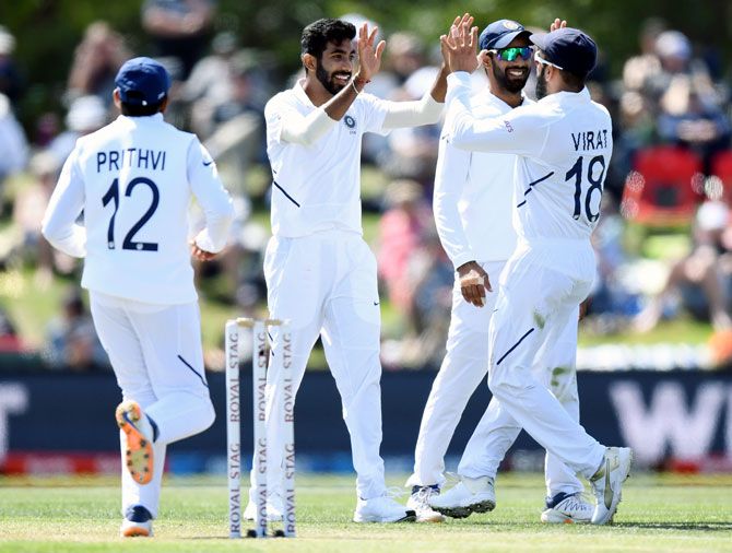 India pacer Jasprit Bumrah gets a high-five from skipper Virat Kohli after dismissing New Zealand's Tim Southee on Day 2 of the second Test, in Christchurch, on Sunday