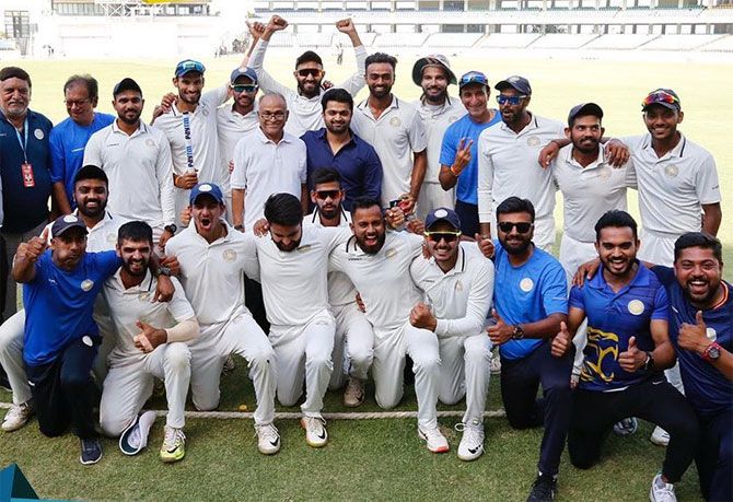 Skipper Jaydev Unadkat and his Saurashtra's players celebrate after winning the Ranji Trophy in 2020