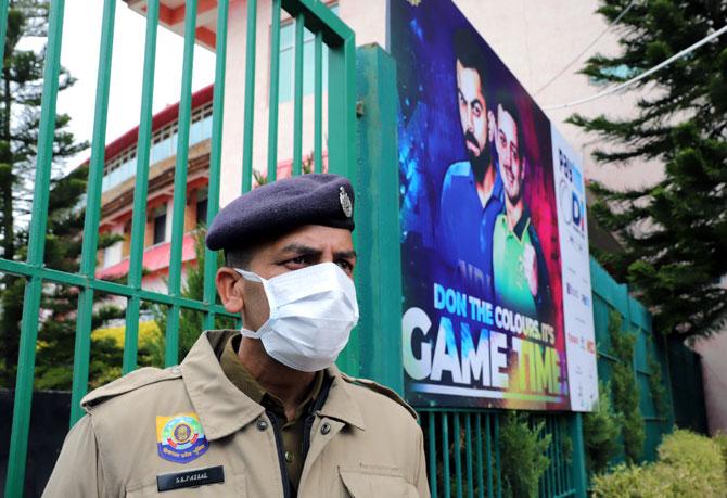 A security guard wearing protective facemask outside  the Himachal Pradesh Cricket Association Stadium, in Dharamsala (Image used for representative purposes)