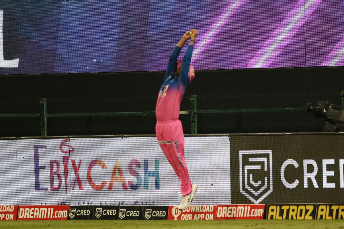 Rajasthan Royals' Rahul Tewatia takes the catch to dismiss Kings XI Punjab's Nicholas Pooran on October 30, 2020.