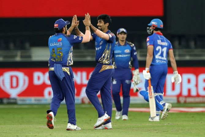 Jasprit Bumrah celebrates with teammates on dismissing Marcus Stoinis. Bumrah finished with figures of 4 for 14.
