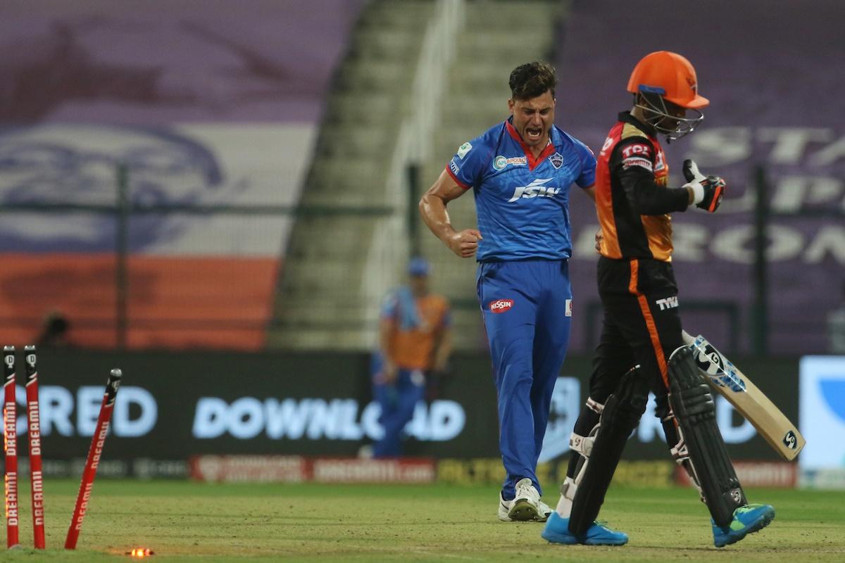 Marcus Stoinis celebrates after sending the ball crashing into Priyam Garg's stumps