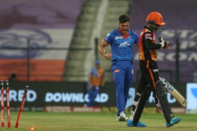 Marcus Stoinis celebrates after sending the ball crashing into Priyam Garg's stumps