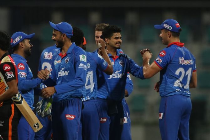 Delhi Capitals players celebrate victory over SunRisers Hyderabad in the Indian Premier League Qualifier 2, in Abu Dhabi, on Sunday