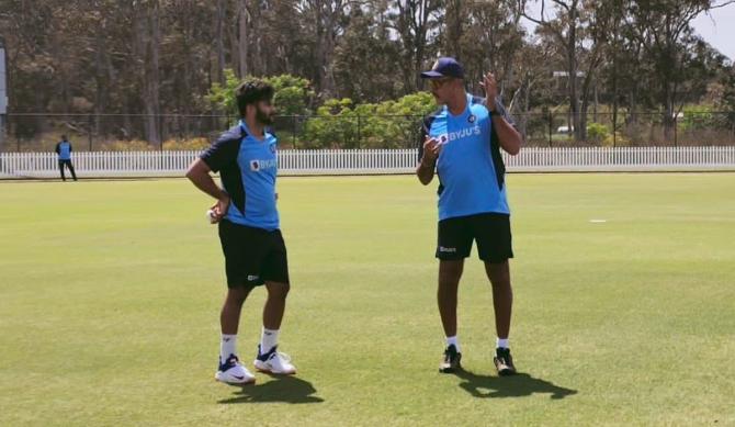 Shardul Thakur gets pointers from coach Ravi Shastri