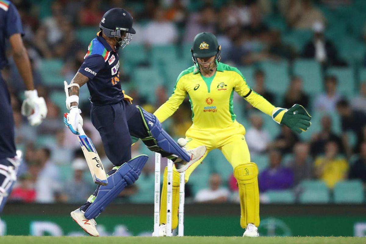 Shikhar Dhawan kicks the ball to keep it from hitting his stumps 