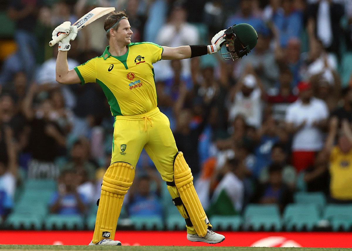 Steve Smith celebrates his century against India in the opening One-Dayer on Friday