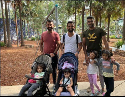 Cheteshwar Pujara, Ajinya Rahane and Ravichandran Ashwin with their girls in a park in Sydney on Monday