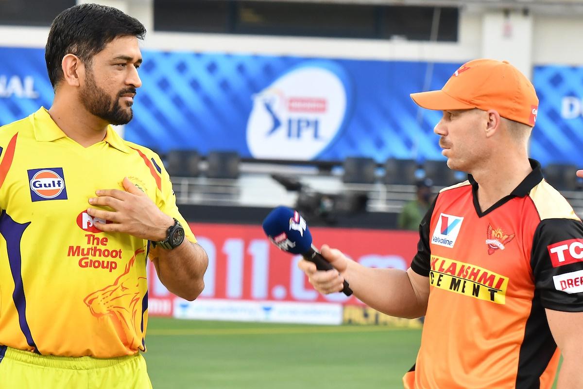 Chennai Super Kings captain Mahendra Dingh Dhoni and Sunrisers Hyderabad captain David Warner chat ahead of their IPL match at the  Dubai International Cricket Stadium, on Friday.