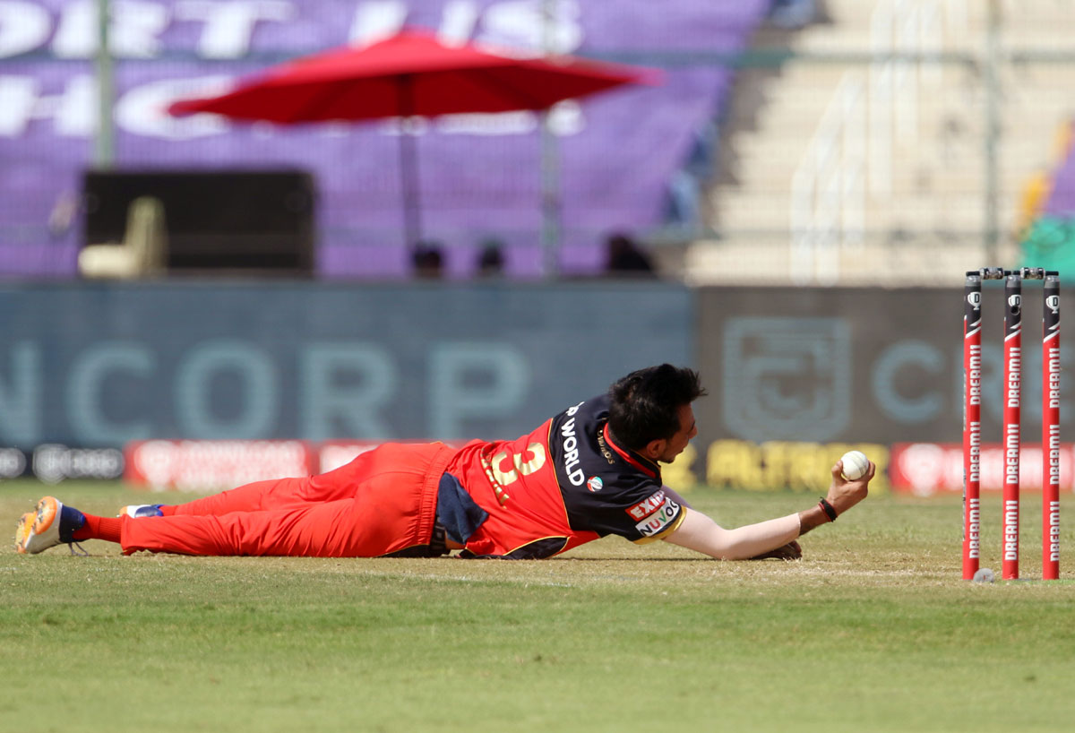 Yuzvendra Chahal takes a catch off his own bowling to dismiss Sanju Samson