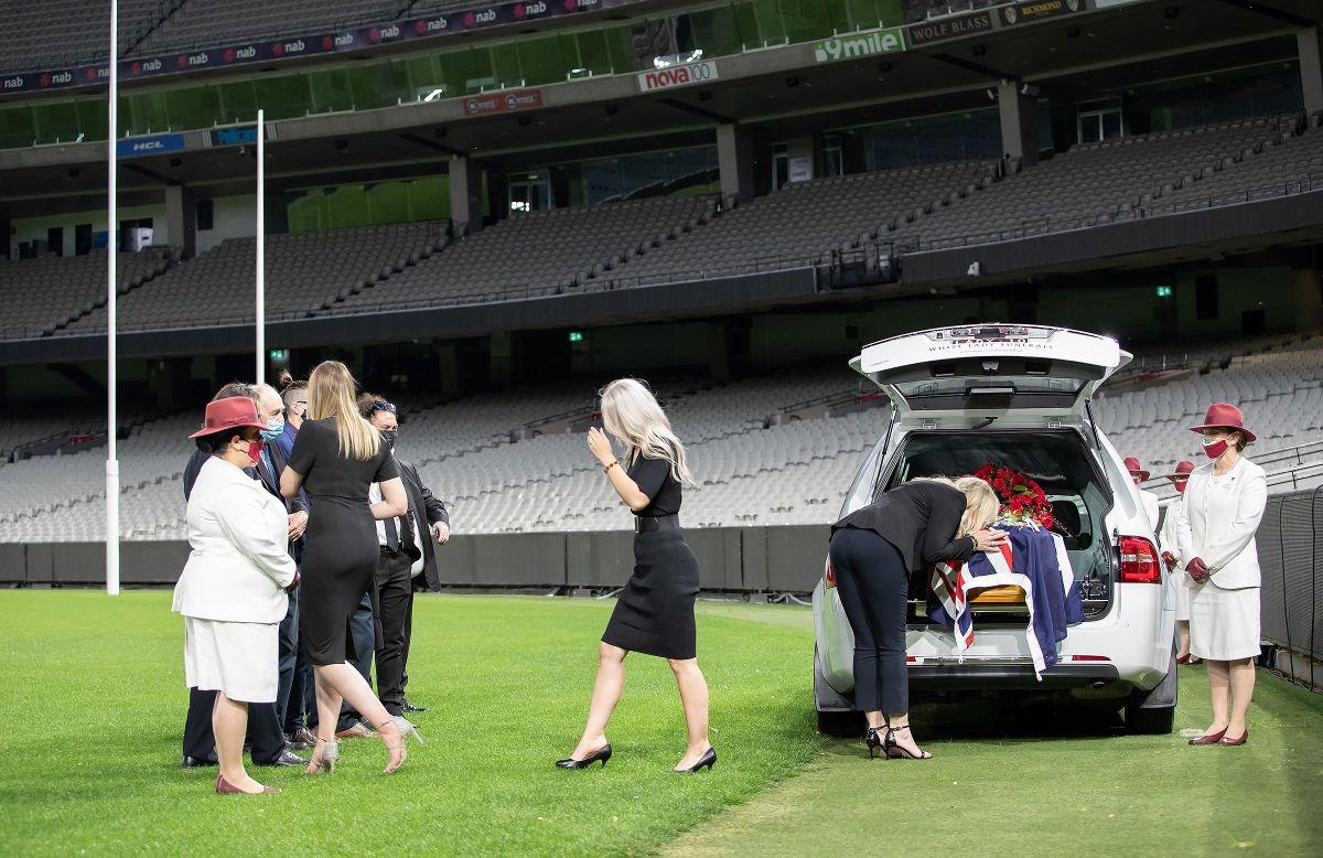 Dean Jones's family pay their respects. Jones's wife Jane, daughters Isabella and Phoebe, and his siblings were among a small group at the ceremony.