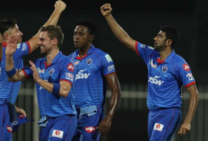 Delhi Capitals players celebrate the dismissal of Jos Buttler.