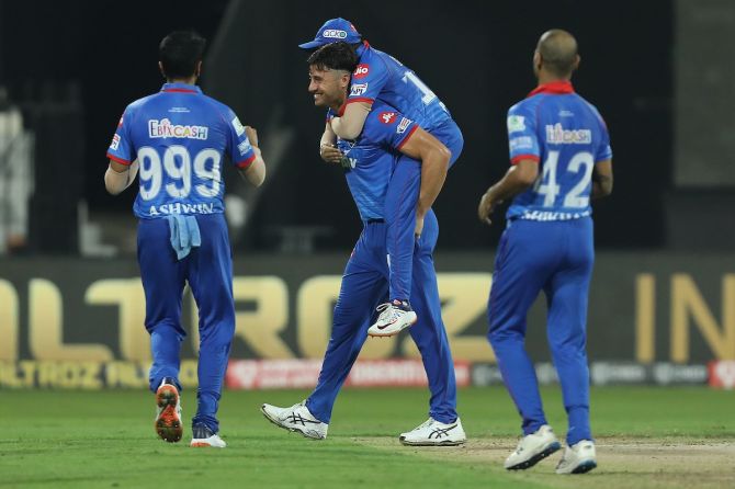 Marcus Stoinis is congratulated by his Rajasthan teammates after dismissing Sanju Samson.