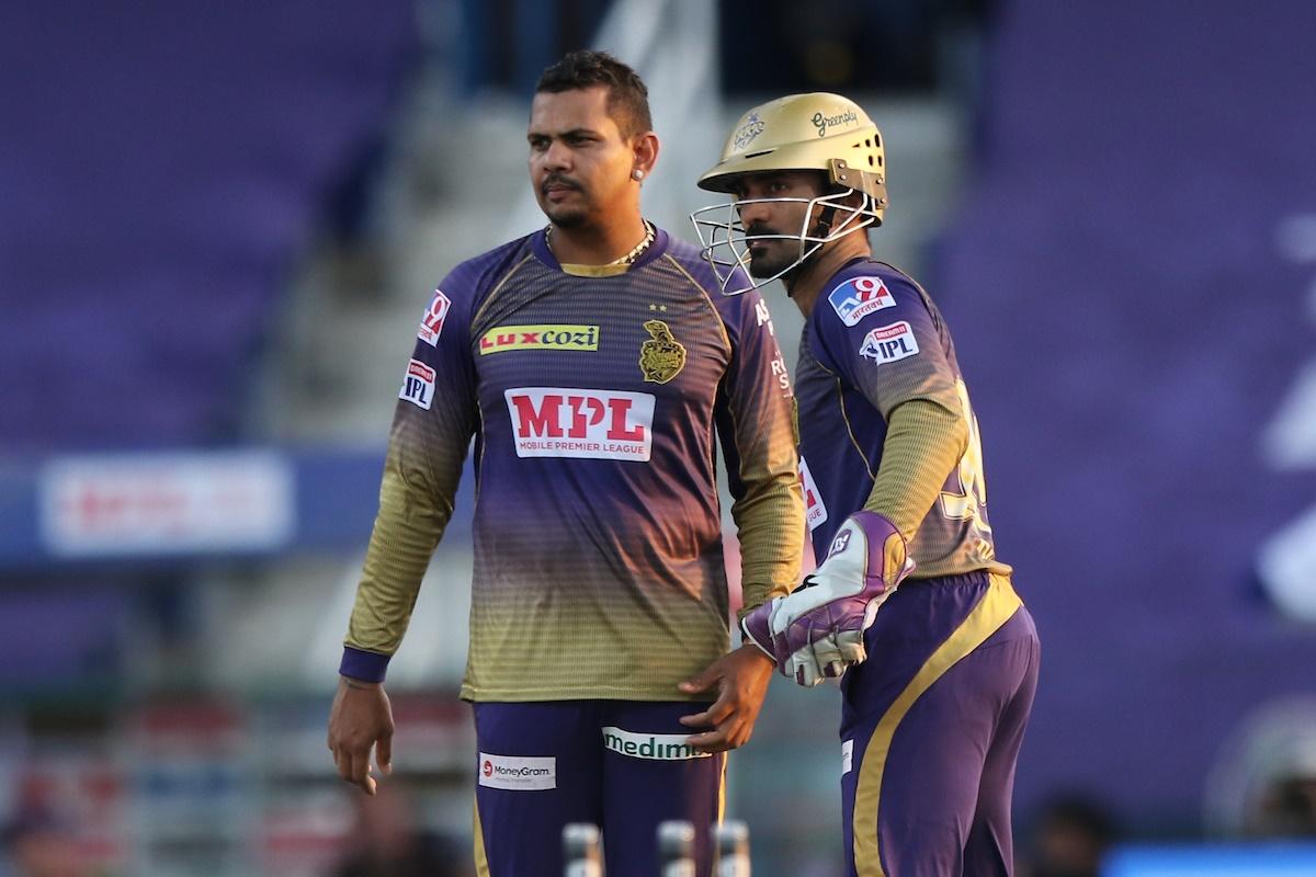 Sunil Narine gets a pat on the back from his Kolkata Knight Riders skipper Dinesh Karthik after dismissing Nicholas Pooran.