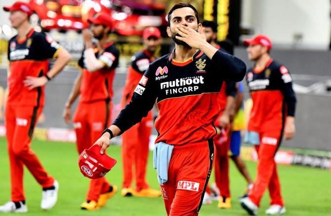 oyal Challengers Bangalore skipper Virat Kohli celebrates with his teammates after trouncing Chennai Super Kings