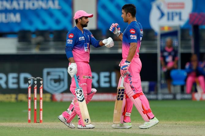 Rahul Tewatia and Riyan Parag celebrate a six