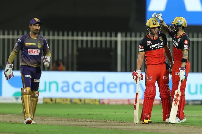 A B deVilliers is congratulated by Virat Kohli after completing his fifty.