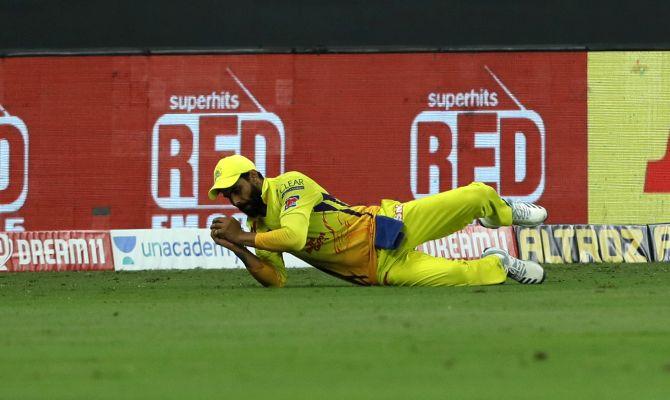 Ravindra Jadeja takes a catch to dismiss Priyam Garg