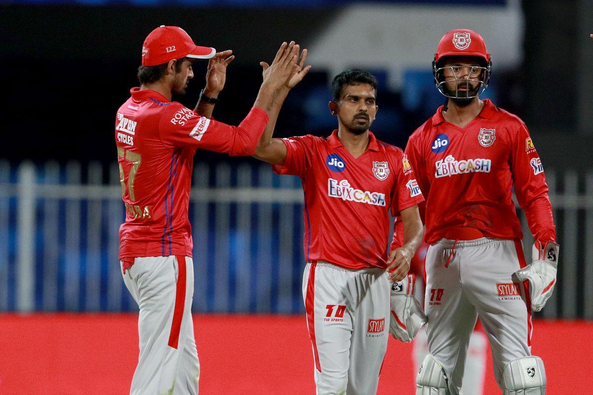 Kings XI Punjab's Murugan Ashwin celebrates after dismissing Royal Challengers Bangalore's Aaron Finch 