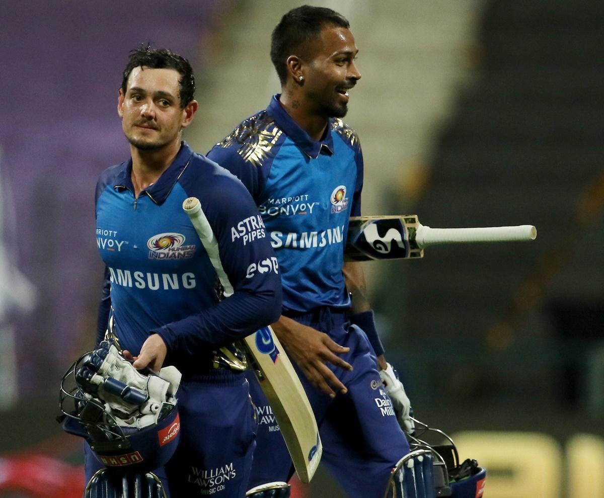 Quinton de Kock and Hardik Pandya celebrate an easy victory