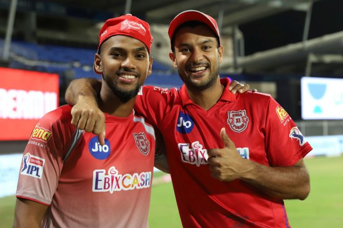 Kings XI Punjab's Mayank Agarwal and Nicholas Pooran are all smiles after their win over Royal Challengers Bangalore in the Indian Premier League at Sharjah Cricket Stadium, in Sharjah on Thursday 