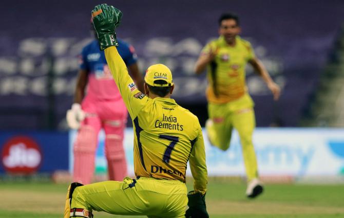 Mahendra Singh Dhoni takes the catch to dismiss Sanju Samson off Deepak Chahar's bowling.