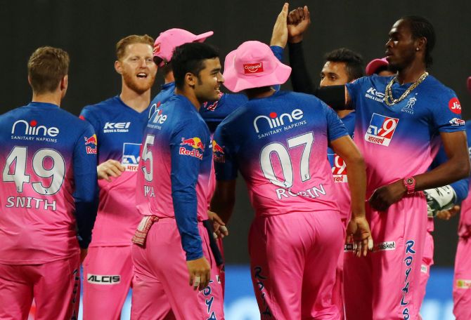 Rajasthan Royals players celebrate the wicket of Faf du Plessis
