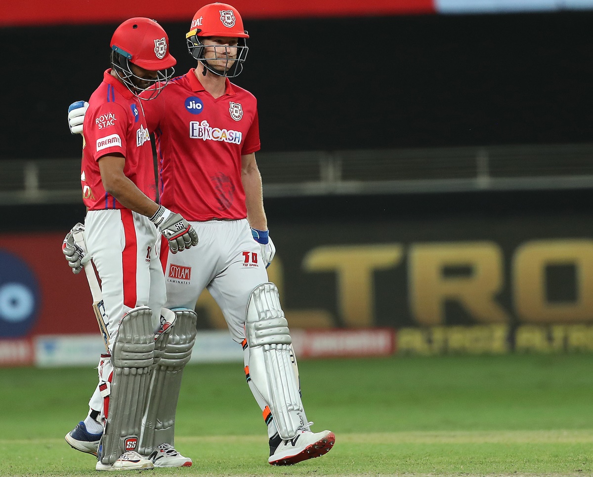 James Neesham and Deepak Hooda walk back after clinching victory for Kings XI