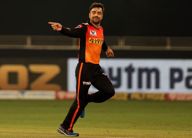 Rashid Khan celebrates the wicket of Ben Stokes