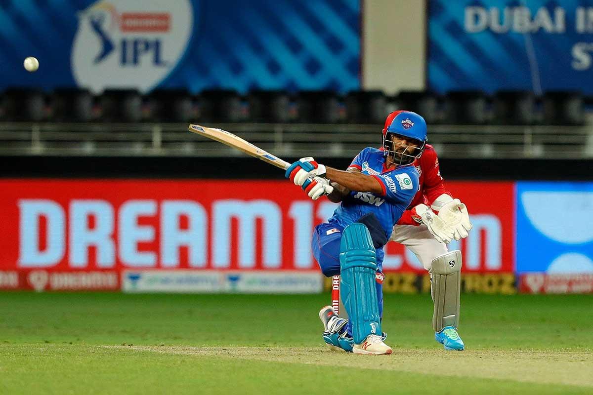 Shikhar Dhawan of Delhi Capitals hits' a boundary during match against the Kings XI Punjab