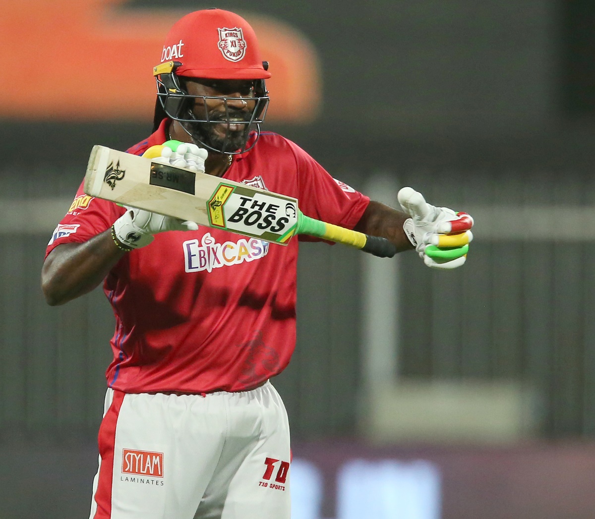 Chris Gayle celebrates after scoring 50