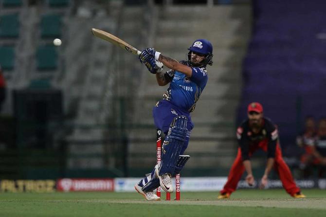 Ishan Kishan of Mumbai Indians plays a shot against the Royal Challengers Bangalore at the Sheikh Zayed Stadium, Abu Dhabi