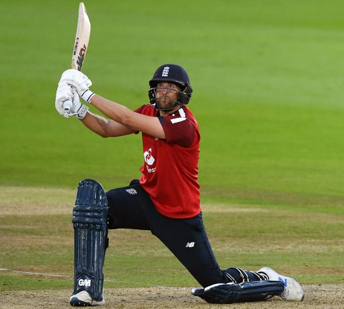 England batsman Dawid Malan hits a boundary during the match against Australia on Friday