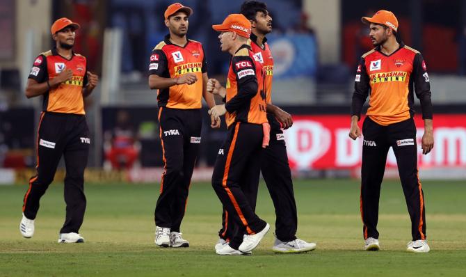 SunRisers Hyderabad players celebrate the wicket of Devdutt Padikkal