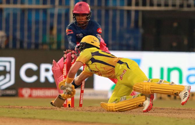 Sam Curran is stumped by wicketkeeper Sanju Samson off Rahul Tewatia's bowling