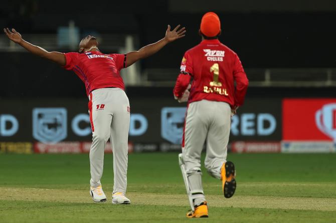 Sheldon Cottrell celebrates the dismissal Virat Kohli.