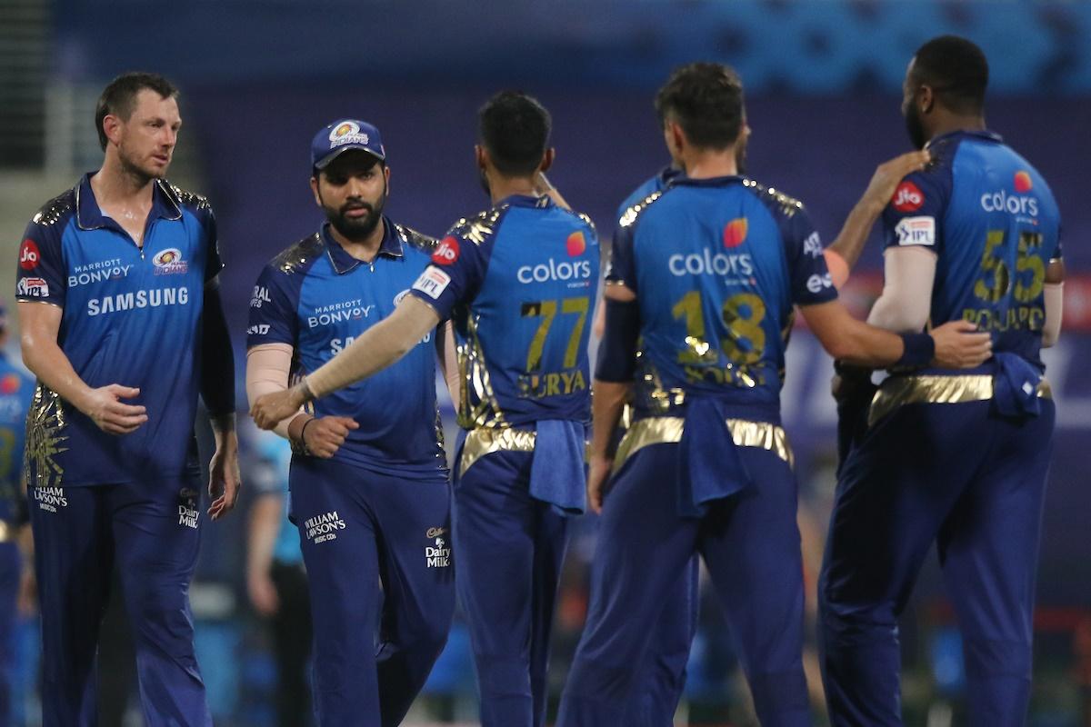 Mumbai Indians captain Rohit Sharma and his teammates celebrate the fall of a Kolkata Knight Riders wicket 