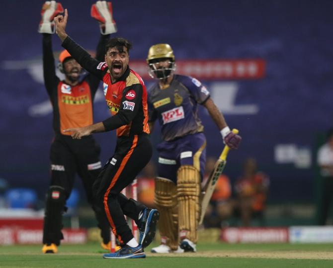 Rashid Khan successfully appeals for leg before against Dinesh Karthik.