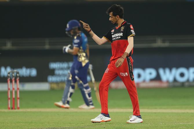 Yuzvendra Chahal celebrates the wicket of Quinton de Kock.