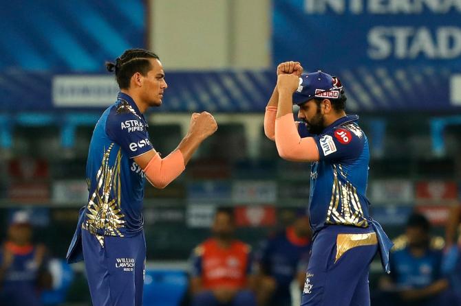 Deepak Chahar is congratulated by skipper Rohit Sharma after dismissing Virat Kohli.